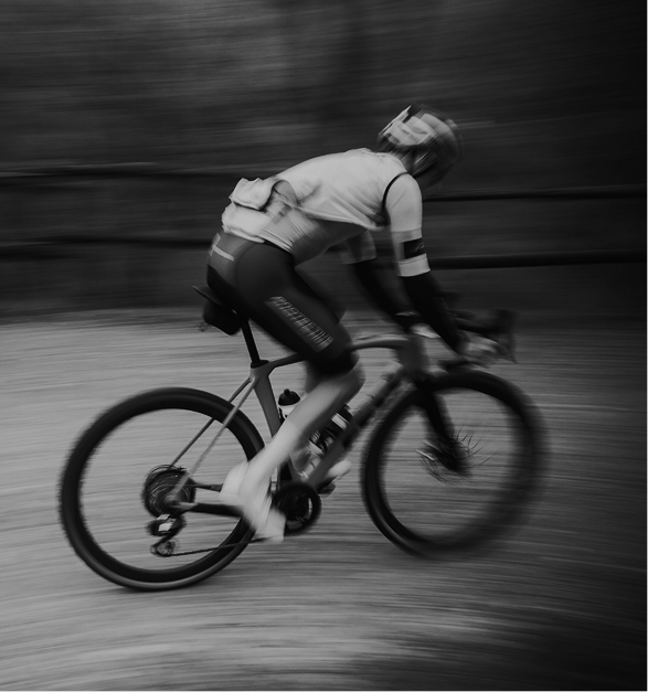 Cyclist riding road bike in athletic training session